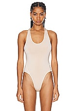 ALAÏA Cut Out Bodysuit in Poudre, view 2, click to view large image.