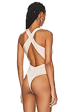 ALAÏA Cut Out Bodysuit in Poudre, view 4, click to view large image.