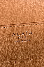 ALAÏA Oum 20 Leather Laser Cut Clutch in Tan Clair, view 6, click to view large image.