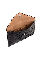 ALAÏA Louise 24 Leather Perforated Clutch in Noir, view 5, click to view large image.