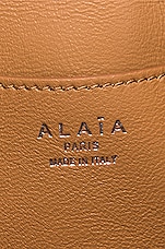 ALAÏA Louise 24 Leather Perforated Clutch in Noir, view 6, click to view large image.