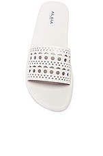 ALAÏA Perforated Flat Sandal in Blanc Casse, view 4, click to view large image.