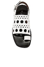 ALAÏA Perforated Flat Sandal in Blanc Casse, view 4, click to view large image.