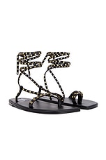ALAÏA Flat Strappy Sandal in Noir, view 1, click to view large image.