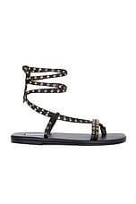 ALAÏA Flat Strappy Sandal in Noir, view 2, click to view large image.