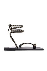 ALAÏA Flat Strappy Sandal in Noir, view 3, click to view large image.