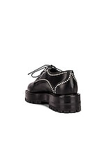 ALAÏA Eyelet Derby Loafers in Noir, view 3, click to view large image.