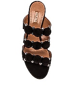 ALAÏA Pom Pom Studded Mules in Noir, view 4, click to view large image.