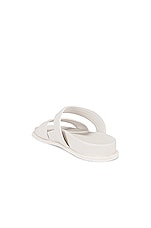 ALAÏA Leather Slides in Blanc Casse, view 3, click to view large image.