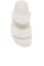ALAÏA Leather Slides in Blanc Casse, view 4, click to view large image.