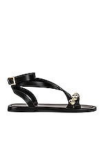 ALAÏA Flat Ankle Strap Sandals in Noir, view 1, click to view large image.
