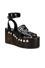ALAÏA Vienne Wooden Ankle Strap Wedges in Noir, view 2, click to view large image.