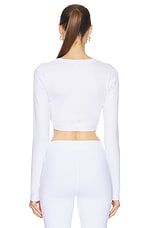 alo Seamless Ribbed Cropped Serene Long Sleeve Top in White, view 3, click to view large image.