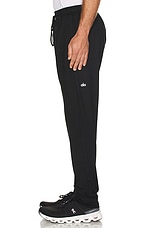 alo Conquer Revitalize Pant in Black, view 4, click to view large image.