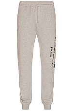 Alexander McQueen Graffiti Print Straight Leg Joggers in Pale Grey & Black, view 1, click to view large image.