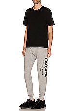 Alexander McQueen Graffiti Print Straight Leg Joggers in Pale Grey & Black, view 5, click to view large image.