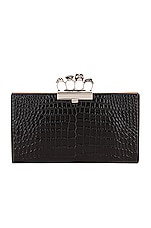 Alexander McQueen Skull Four Ring Flat Clutch in Black, view 1, click to view large image.
