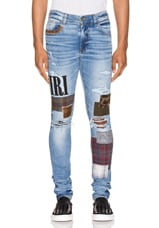 Amiri Grunge Patch Jean in Medium Crafted Indigo | FWRD