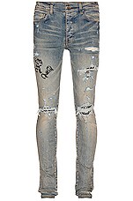 Amiri Old English Logo Jean in Clay Indigo | FWRD Amiri Old English Logo Jean in Clay Indigo | FWRD
