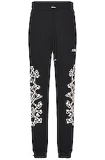 Amiri Checkered Bones Sweatpants in Black | FWRD