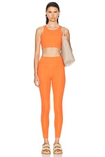 Beyond Yoga Powerbeyond Strive High Waisted Midi Legging in Sunset Orange, view 4, click to view large image.