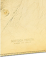 Bottega Veneta Small Metallic Wallet in Gold, view 5, click to view large image.