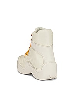 Bottega Veneta Puddle Bomber Boots in String & Egg Yolk, view 3, click to view large image.