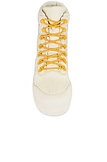 Bottega Veneta Puddle Bomber Boots in String & Egg Yolk, view 4, click to view large image.