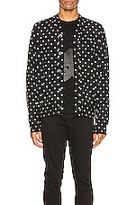COMME des GARCONS PLAY Dot Print Wool Cardigan with Black Emblem in Black & Natural, view 1, click to view large image.