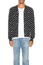 COMME des GARCONS PLAY Dot Print Wool Cardigan with Black Emblem in Navy & Natural, view 1, click to view large image.