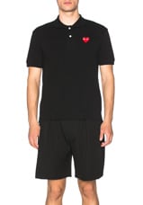 COMME des GARCONS PLAY Cotton Polo with Red Emblem in Black, view 1, click to view large image.