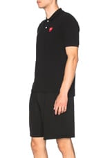 COMME des GARCONS PLAY Cotton Polo with Red Emblem in Black, view 2, click to view large image.