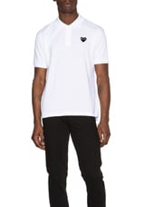 COMME des GARCONS PLAY Cotton Polo with Black Emblem in White, view 1, click to view large image.