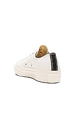 COMME des GARCONS PLAY Converse Large Emblem Low Top Canvas Sneakers in White, view 3, click to view large image.