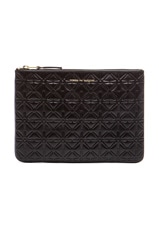 COMME des GARCONS Star Embossed Pouch in Black, view 1, click to view large image.