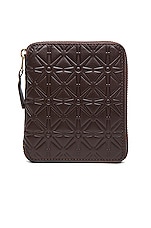 COMME des GARCONS Star Embossed Zip Fold Wallet in Brown, view 1, click to view large image.
