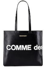 COMME des GARCONS Huge Logo Tote Bag in Black, view 1, click to view large image.