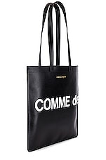COMME des GARCONS Huge Logo Tote Bag in Black, view 3, click to view large image.