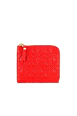 COMME des GARCONS Embossed Zip Wallet in Orange, view 1, click to view large image.