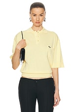 Coperni Knotted Short Sleeved Polo Top in Pale Yellow, view 1, click to view large image.