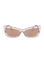 Dolce & Gabbana Cat Eye Sunglasses in Transparent Pink, view 1, click to view large image.