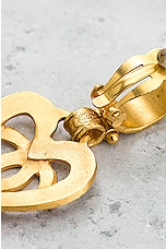 FWRD Renew Chanel Coco Mark Dangling Heart Clip On Earrings in Light Gold, view 4, click to view large image.