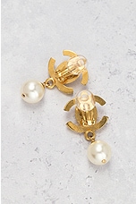 FWRD Renew Chanel Pearl Turnlock Clip-On Earrings in Gold, view 4, click to view large image.