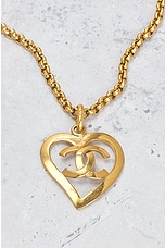 FWRD Renew Chanel Coco Heart Pendant Necklace in Light Gold, view 3, click to view large image.