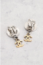 FWRD Renew Chanel Coco Mark Coin Clip-On Earrings in Silver & Gold, view 3, click to view large image.