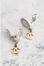 FWRD Renew Chanel Coco Mark Coin Clip-On Earrings in Silver & Gold, view 4, click to view large image.
