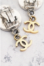FWRD Renew Chanel Coco Mark Coin Clip-On Earrings in Silver & Gold, view 5, click to view large image.