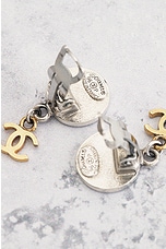 FWRD Renew Chanel Coco Mark Coin Clip-On Earrings in Silver & Gold, view 6, click to view large image.