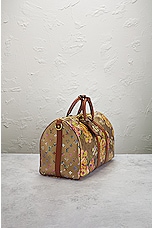 FWRD Renew Louis Vuitton Metallic Garden Keepall Bandouliere 45 Bag in Multi, view 4, click to view large image.