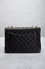 FWRD Renew Chanel Jumbo XL Quilted Turnlock Half Flap Shoulder Bag in Black, view 3, click to view large image.